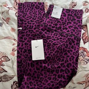 Women’s size medium cheetah print leggings -purple
